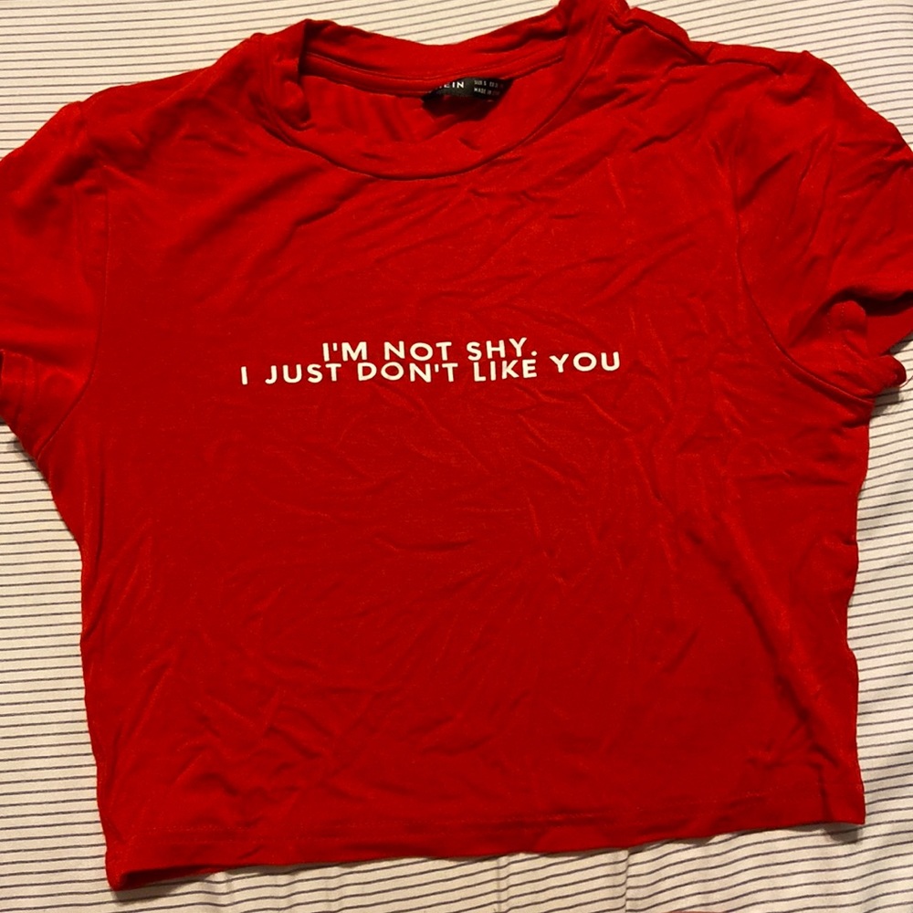red crop top, says im not shy i just don’t like you